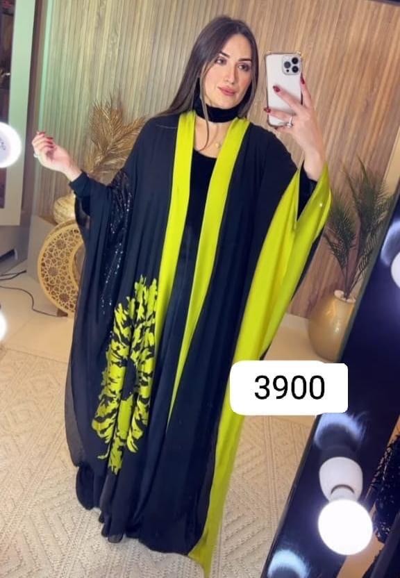 بلوزة سوداء وخضراء